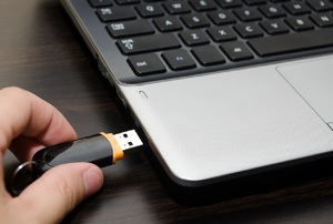 plugging a USB into a computer