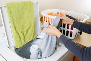 A woman washing clothes.