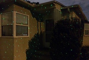 A house lit with lasers