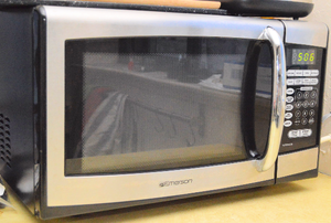 The front to a microwave oven.