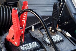 Closeup of Jumper Cables on Automobile Battery