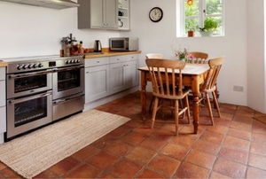 kitchen with terracotta tile floor