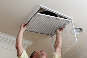 Air conditioner filter installation.