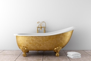 Freestanding bathtub with a gold-colored finish