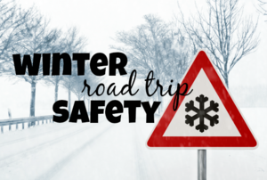 A snowy road with the words "winter road trip safety."