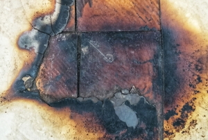 a large burn mark in a countertop