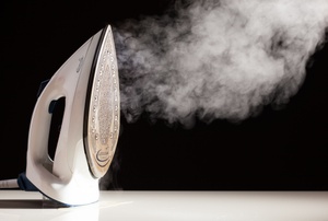 Steam comes out of an iron.
