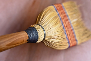 broom on a wooden floor