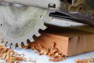 a circular saw resting on a piece of lumber