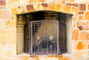 A limestone fireplace.
