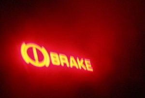 the emergency brake is lit up on car dashboard
