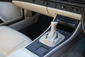 A vehicle with light colored vinyl interior.