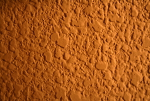 A brown textured ceiling.