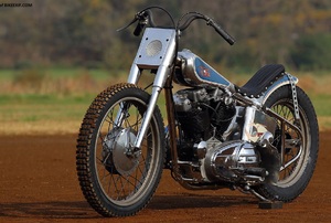 A motorcycle on a dirt road.