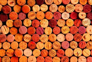 A background of wine corks.