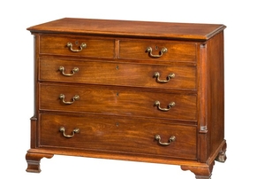 Wooden chest of drawers with brass hardware