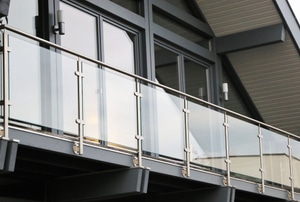 A balcony with a railing.