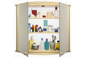 Medicine cabinet with doors open, showing three rows of products
