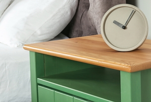 bedside nightstand with clock