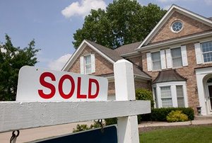 House sold sign