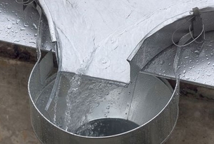 metal gutter system in the rain