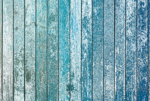 blue painted wooden wall or fence