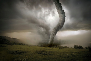tornado spinning above field