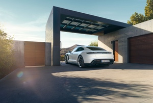 A white car in a driveway.