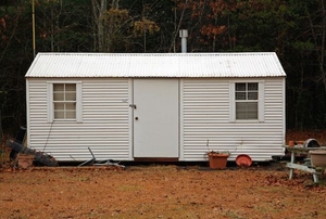 freshly painted metal shed