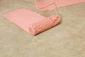 Painting a patio pink.