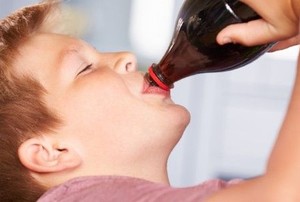 boy drinking soda