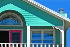 A turquoise cottage. 