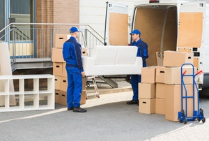 Movers with a couch.