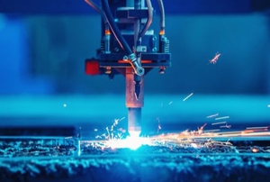 laser welding machine heating metal with bright light