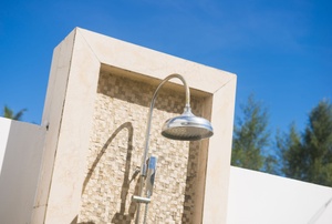 A brick outdoor shower.