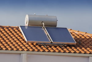 A solar water heater on a roof.