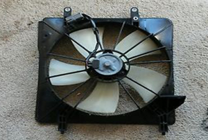 radiator fan laying on the ground