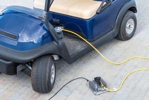 golf cart plugged into charging port