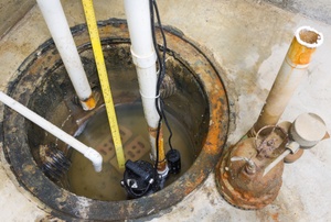 A sump pump in the ground.