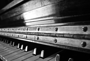 piano hinge exposed above the piano keys