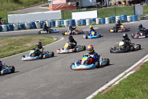 several racers on a go kart track