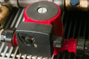 A circulation pump connected to pipes.