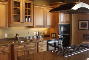 A kitchen with granite counters.