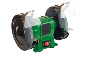 A bench grinder on a white background.