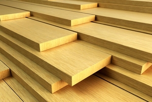 A pile of wooden planks, ready to be used.