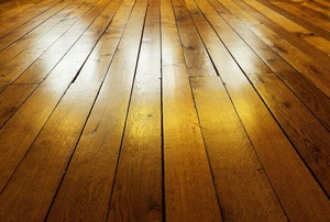Light reflecting off hardwood flooring