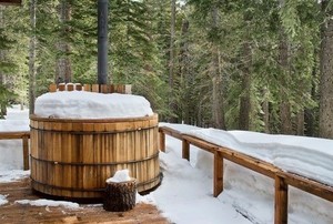 hot tub covered in winter snow