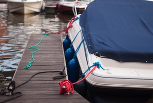 a boat tied to a dock
