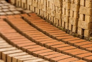 bricks laid out as part of a walkway under construction