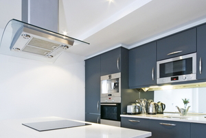 clean, modern kitchen with large ceiling extractor fan